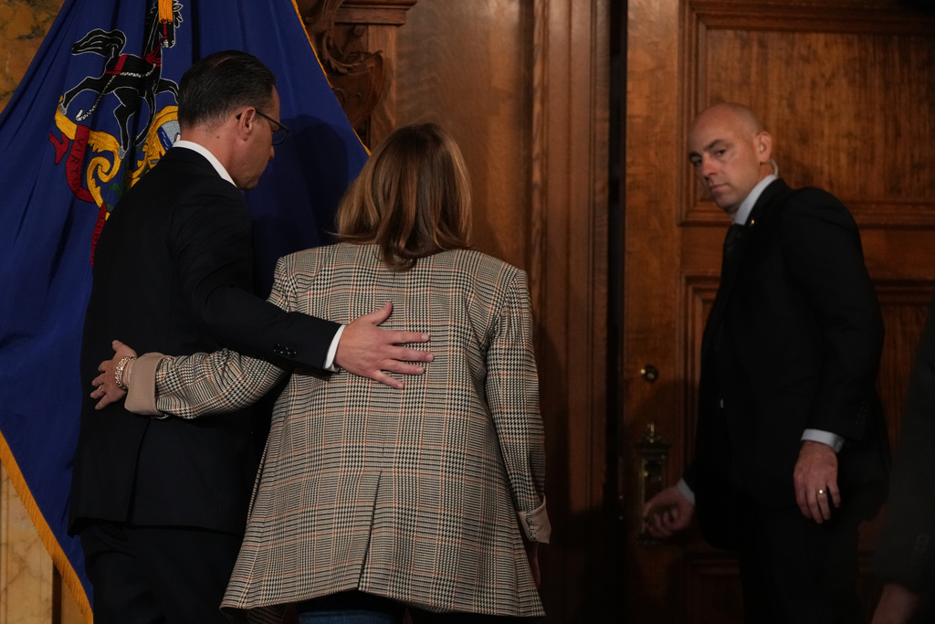 Pennsylvania Gov. Josh Shapiro and his wife Lori Shapiro, exit a news conference on Tuesday, Oct. 14, 2025 in Harrisburg, Pa. (AP Photo/Matt Slocum)