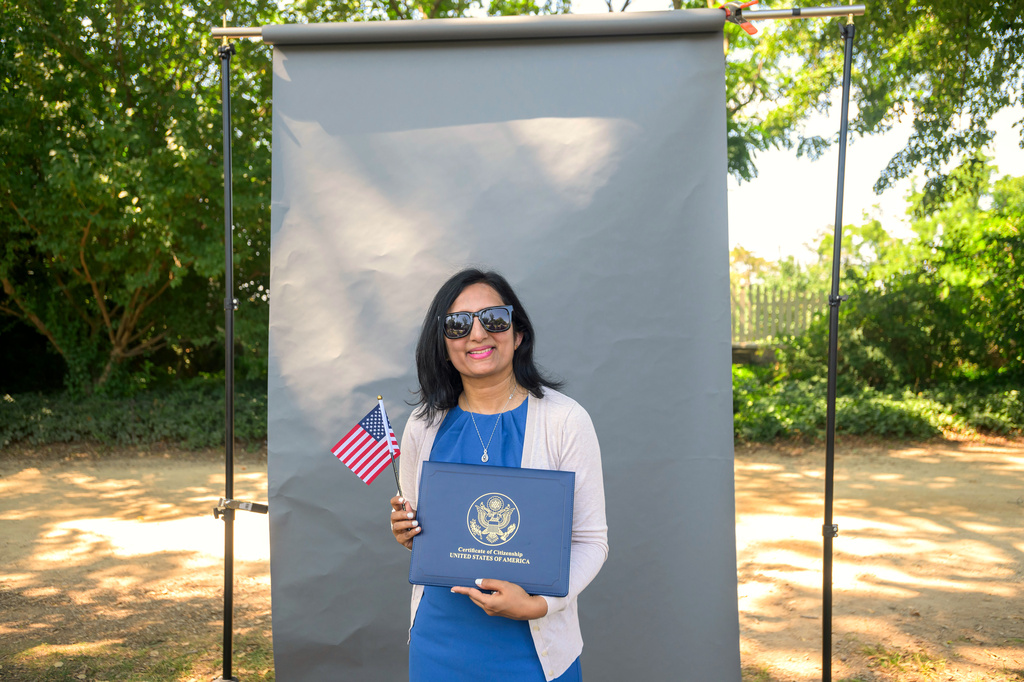 New U.S. citizen Raina Pinto, from India, poses for a portrait following a naturalization ceremony on Independence Day at George Washington's Mount Vernon, Saturday, July 4, 2026, in Alexandria, Va. (AP Photo/Rod Lamkey, Jr.)