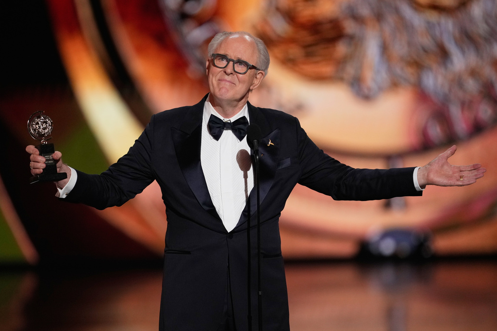 John Lithgow accepts the award for best performance by a leading actor in a play for "Giant" during the 79th Tony Awards on Sunday, June 7, 2026, at Radio City Music Hall in New York. (Photo by Charles Sykes/Invision/AP)