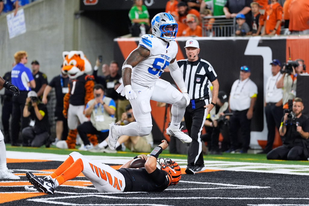 Detroit Lions linebacker Derrick Barnes (55) reacts to sacking Cincinnati Bengals quarterback Jake Browning (6) for a safety during the second half of an NFL football game Sunday, Oct. 5, 2025, in Cincinnati. (AP Photo/Carolyn Kaster)