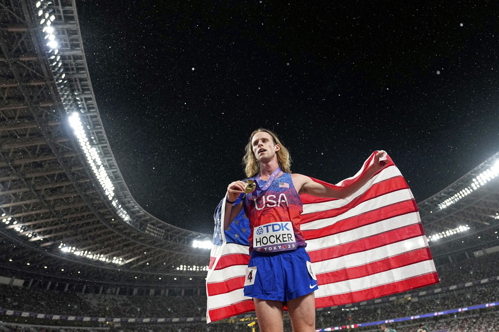 United States' Cole Hocker celebrates winning the gold in the men's 5,000 meters final at the World Athletics Championships in Tokyo, Sunday, Sept. 21, 2025. (AP Photo/Petr David Josek)