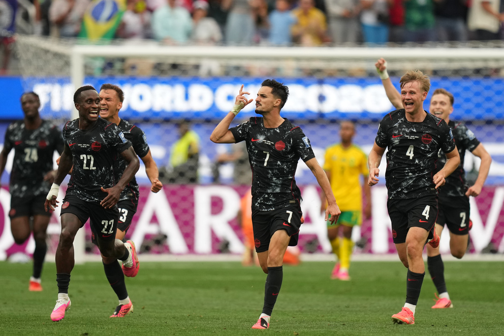 Canada's Stephen Eustaquio (7) celebrates scoring their opening goal against South Africa during the World Cup round of 32 soccer match in Inglewood, Calif., near Los Angeles, Sunday, June 28, 2026. (AP Photo/Andre Penner)