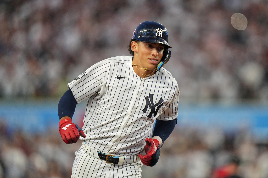New York Yankees' George Lombard Jr. runs the bases after hitting a home run during the fifth inning of a baseball game against the St. Louis Cardinals Tuesday, Aug. 4, 2026, in New York. (AP Photo/Frank Franklin II)