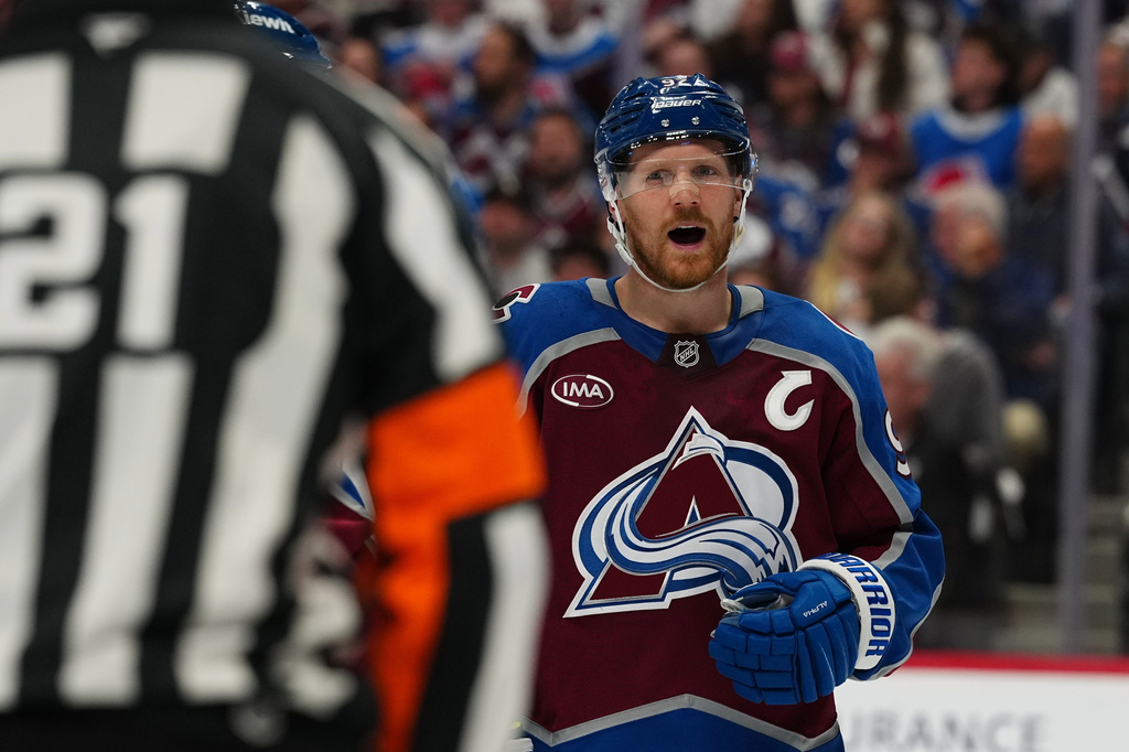 Colorado Avalanche left wing Gabriel Landeskog (92) argues a call with referee TJ Luxmore (21) during the second period of Game 2 in the first round of the NHL hockey Stanley Cup playoffs against the Los Angeles Kings, Tuesday, April 21, 2026, in Denver. (AP Photo Jack Dempsey)