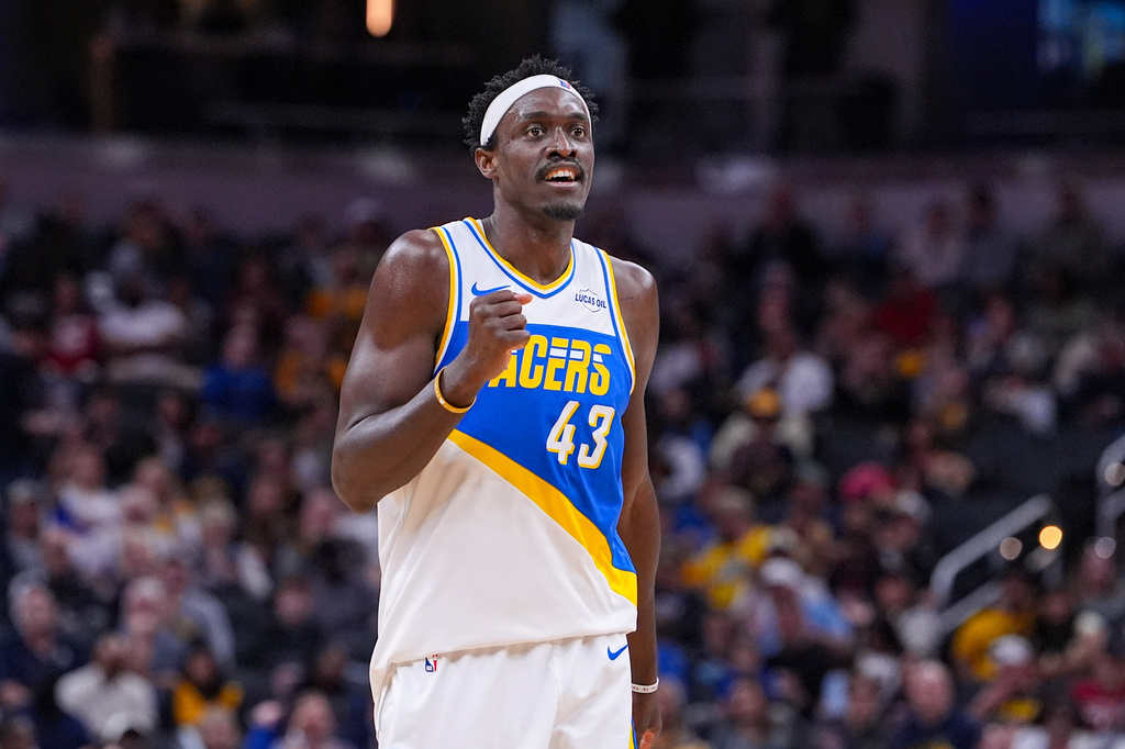 Indiana Pacers forward Pascal Siakam (43) celebrates after a basket and a being fouled against the Miami Heat during the first half of an NBA basketball game in Indianapolis, Sunday, March 29, 2026. (AP Photo/Michael Conroy)