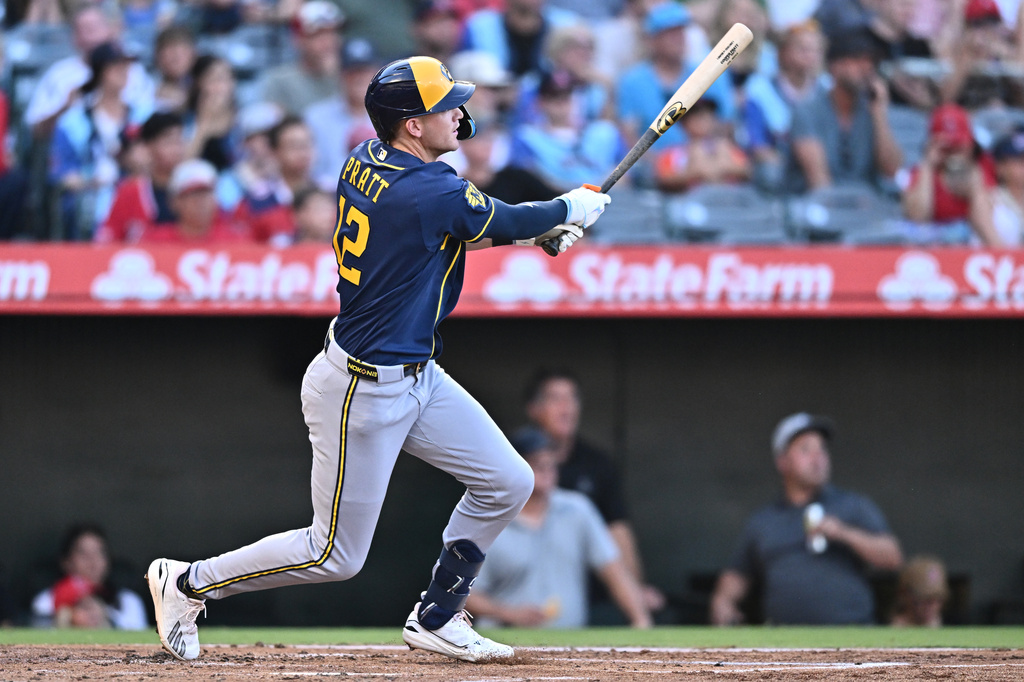 Milwaukee Brewers' Cooper Pratt watches his RBI double during the second inning of a baseball game against the Los Angeles Angels, Friday, July 31, 2026, in Anaheim, Calif. (AP Photo/William Liang)