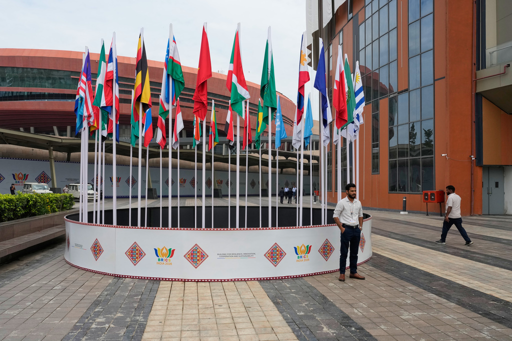 Flags of BRICS member and partner countries flutter at Bharat Mandapam, the main venue of the summit, in New Delhi, India, Saturday, Sept. 12, 2026 (AP Photo/Manish Swarup)