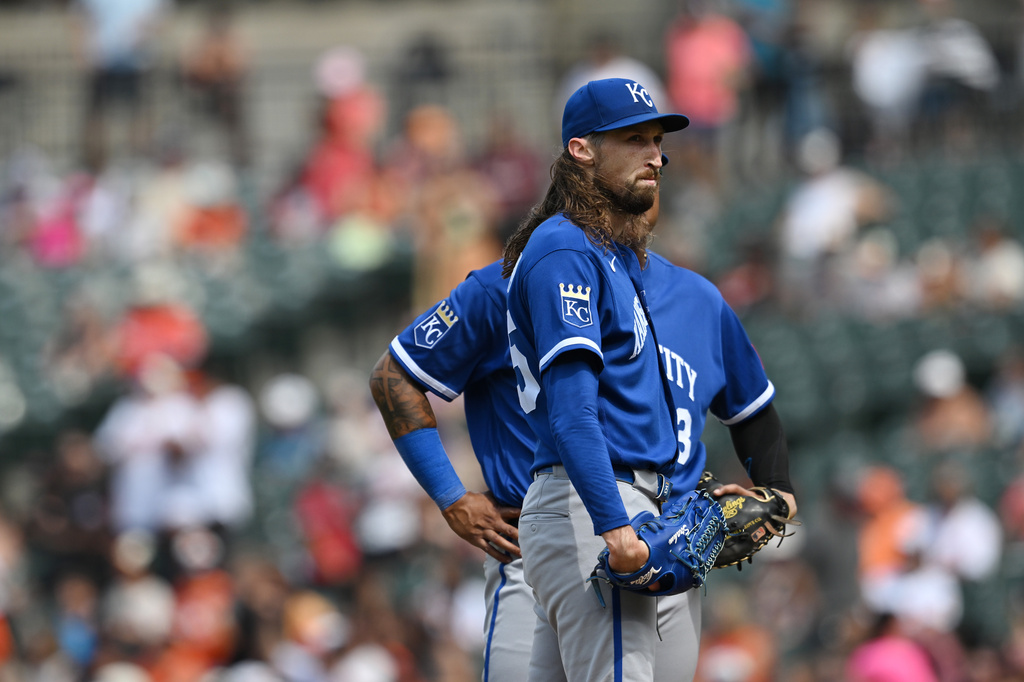 Kansas City Royals pitcher Matt Strahm, front, pauses after giving up four runs to the Baltimore Orioles in the sixth inning of a baseball game Sunday, July 12, 2026, in Baltimore. (AP Photo/Gail Burton)