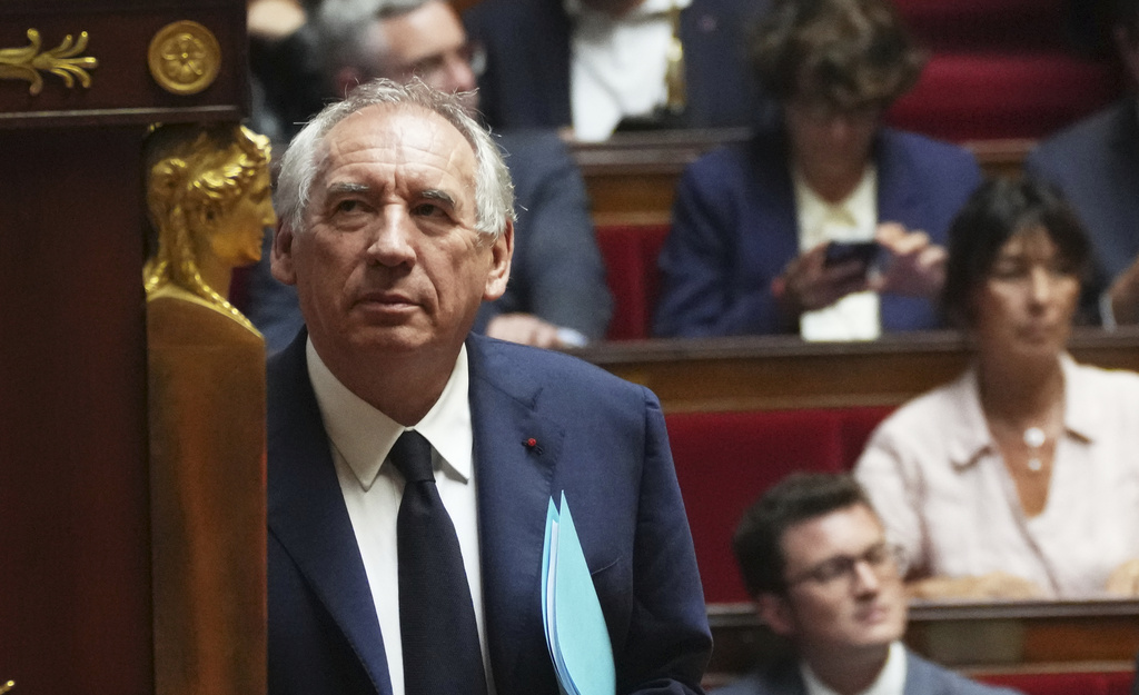French Prime Minister Francois Bayrou arrives to address the National Assembly, prior to a parliamentary confidence vote that could bring him down, in Paris, France, Monday, Sept. 8, 2025. (AP Photo/Christophe Ena)