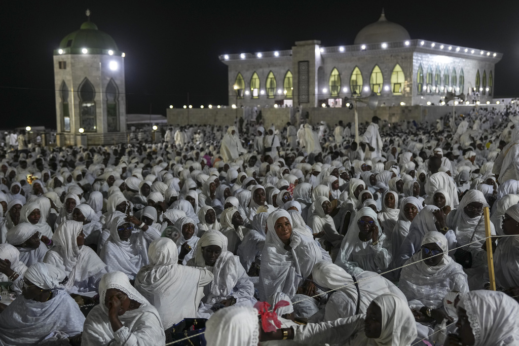 Worshippers gather to mark Prophet Muhammad's birthday, known as Mawlid, in Dakar, Senegal, Thursday, Sept 4, 2025. (AP Photo/Misper Apawu)