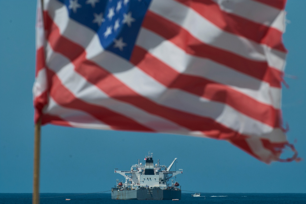 Crude oil tanker "Chios" has its cargo pumped into the Chevron Products Company refinery, one of California's largest petroleum processing facilities, in El Segundo, Calif., on Friday, April 17, 2026. (AP Photo/Damian Dovarganes)