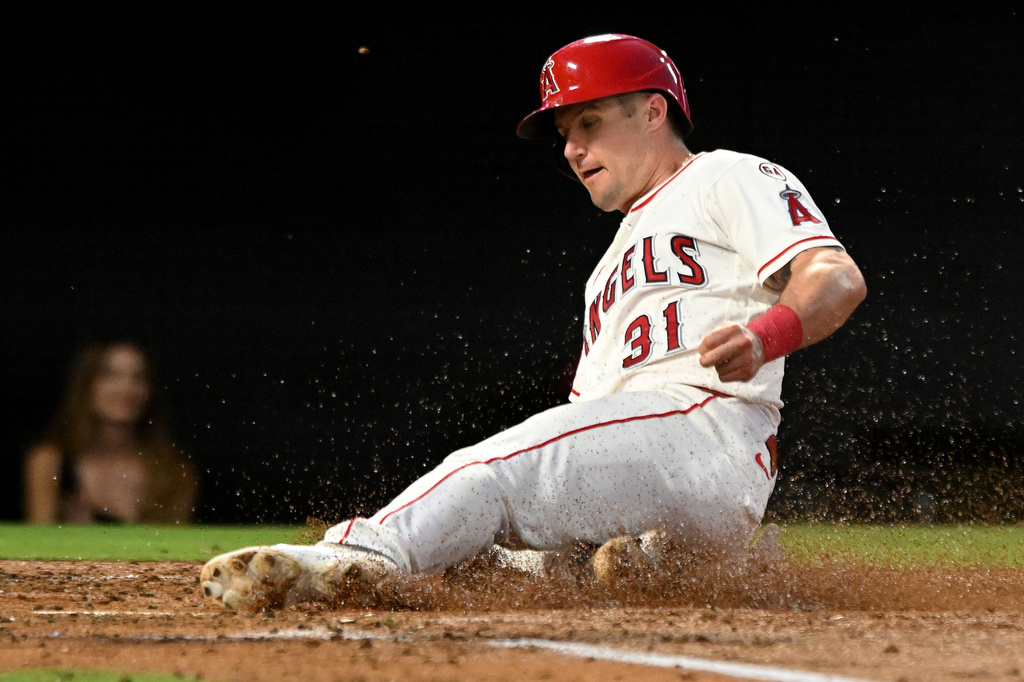 Los Angeles Angels' Tyler Heineman (31) scores a run against the New York Yankees in the third inning of a baseball game Monday, Aug. 31, 2026, in Anaheim, Calif. (AP Photo/Wally Skalij)