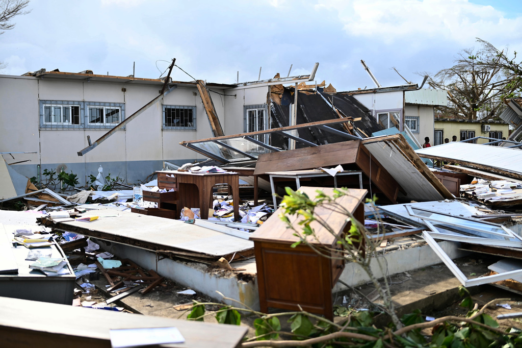 People survey the damage done by cyclone Gezani in Toamasina, Madagascar, Wednesday, Feb. 11, 2026. (AP Photo/Hery Nirina Rabary)