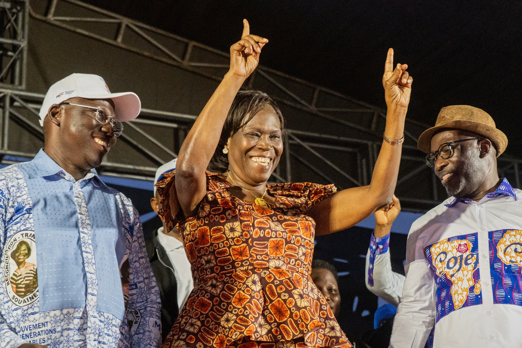 Presidential candidate Simone Ehivet Gbagbo and her team attend a rally in Guiberoua, Ivory Coast, Tuesday, Oct 14, 2025. (AP Photo/ Marine Jeannin)