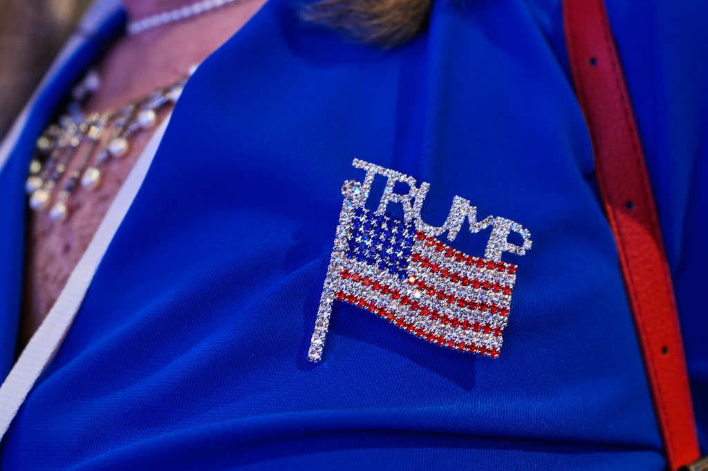 An attendee wears party colors at a primary election night party for Georgia gubernatorial candidate Rick Jackson on Tuesday, May 19, 2026, in Atlanta. (AP Photo/Brynn Anderson)