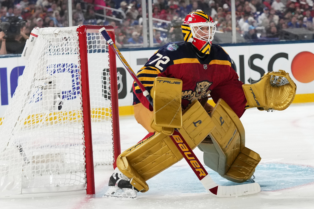 FILE - Florida Panthers goaltender Sergei Bobrovsky defends the goal during the second period of the NHL Winter Classic outdoor hockey game against the New York Rangers Jan. 2, 2026, in Miami. (AP Photo/Lynne Sladky, File)