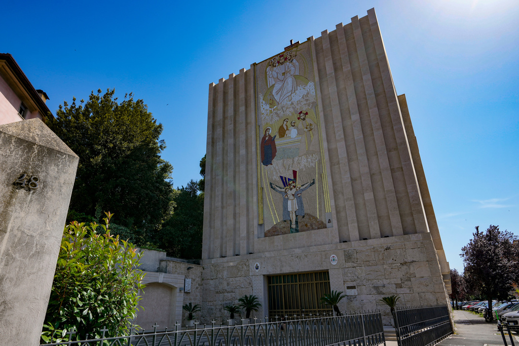 FILE - A mosaic by ex-Jesuit artist Marko Rupnik is seen on the main facade of the Church of Our Lady of the Canadian Martyrs, June 28, 2024, in Rome. (AP Photo/Andrew Medichini, File)