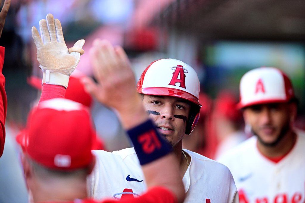 Los Angeles Angels Vaughn Grissom celebrates scoring a run against the Houston Astros during the first inning of a baseball game Wednesday, July 29, 2026, in Anaheim, Calif. (AP Photo/Wally Skalij)