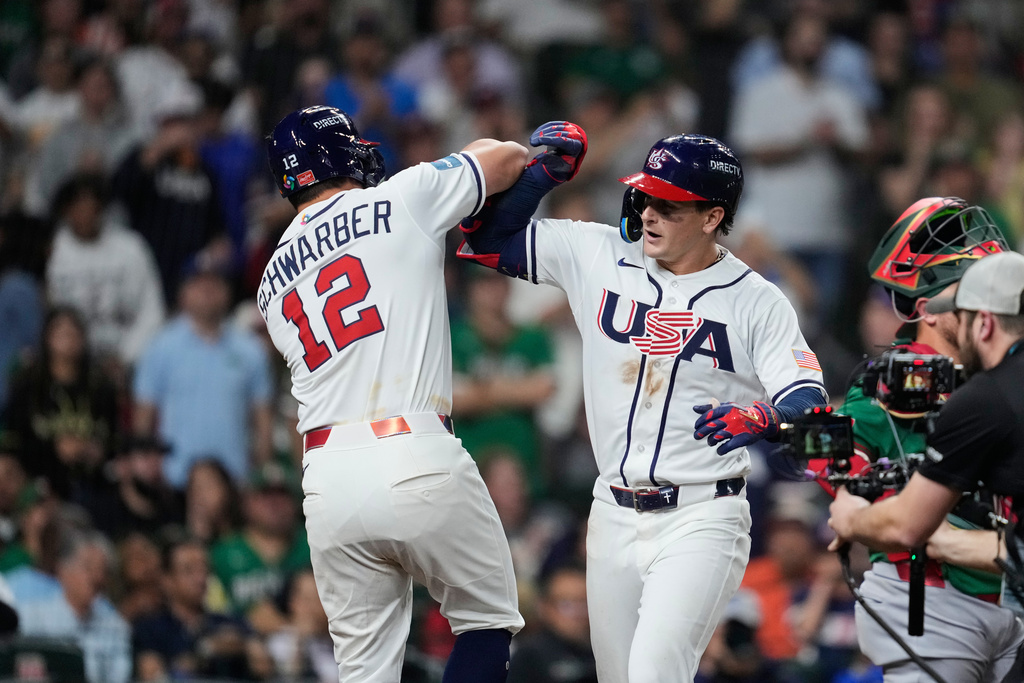 United States' Roman Anthony, right, celebrates with Kyle Schwarber (12) after hitting a three-run home run during the third inning of a World Baseball Classic game against Mexico, Monday, March 9, 2026, in Houston. (AP Photo/Ashley Landis)
