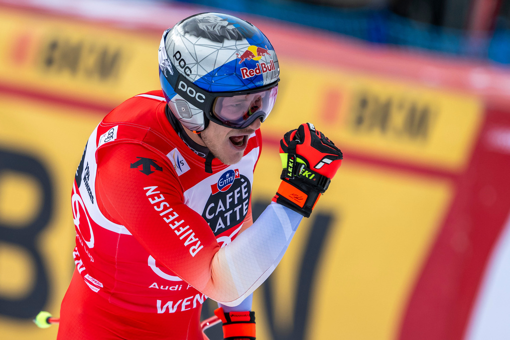 Switzerland's Marco Odermatt reacts in the finish area during an alpine ski, men's World Cup downhill race, in Wengen, Switzerland, Saturday, Jan. 17, 2026. (Peter Schneider/Keystone via AP)