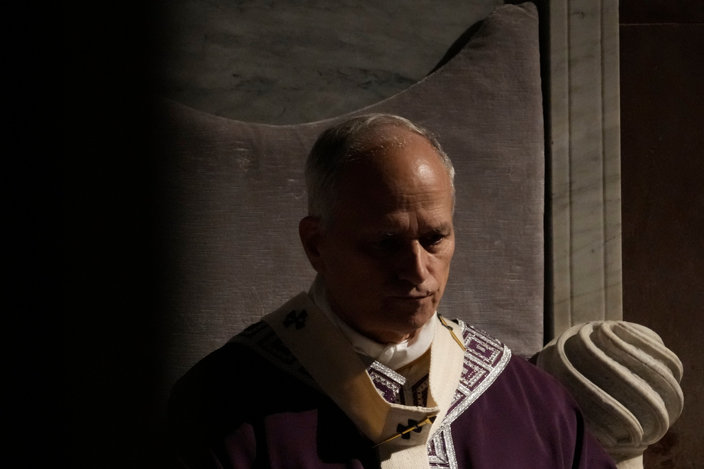 Pope Leo XIV presides over Ash Wednesday Mass, marking the start of the Catholic Lent, inside the Basilica of Santa Sabina in Rome, Wednesday, Feb. 18, 2026. (AP Photo/Gregorio Borgia)