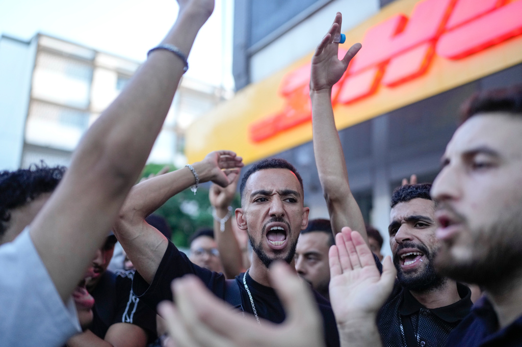 People take part in a protest against corruption and calling for healthcare and education reform, in Rabat, Morocco, Thursday, Oct. 2, 2025. (AP Photo/Mosa'ab Elshamy)