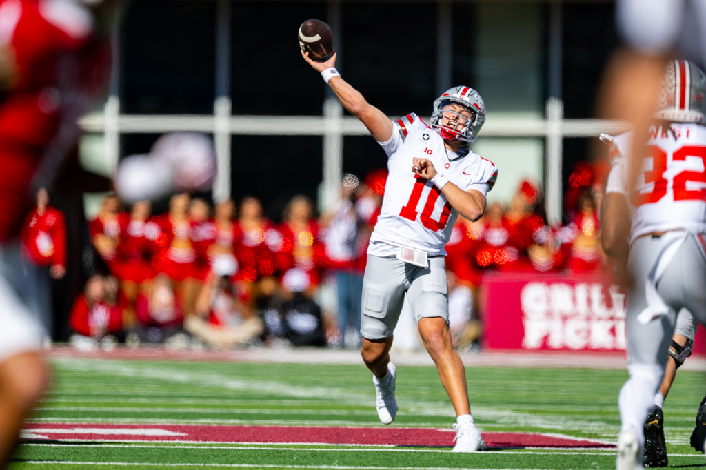 Ohio State quarterback Julian Sayin (10) makes a pass deep upfield during the second half of an NCAA college football game against Indiana, Saturday, Oct. 17, 2026, in Bloomington, Ind. (AP Photo/Doug McSchooler)