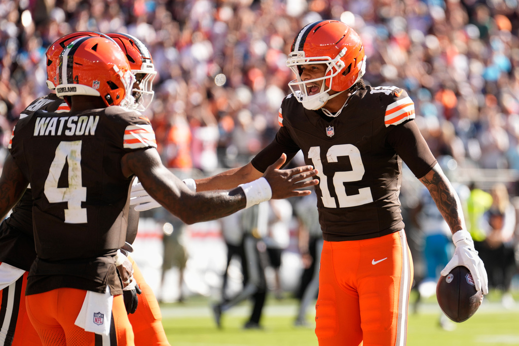 Cleveland Browns wide receiver Denzel Boston (12) celebrates after scoring a two-point conversion against the Carolina Panthers during the second half of an NFL football game in Cleveland, Thursday, Aug. 27, 2026. (AP Photo/Sue Ogrocki)