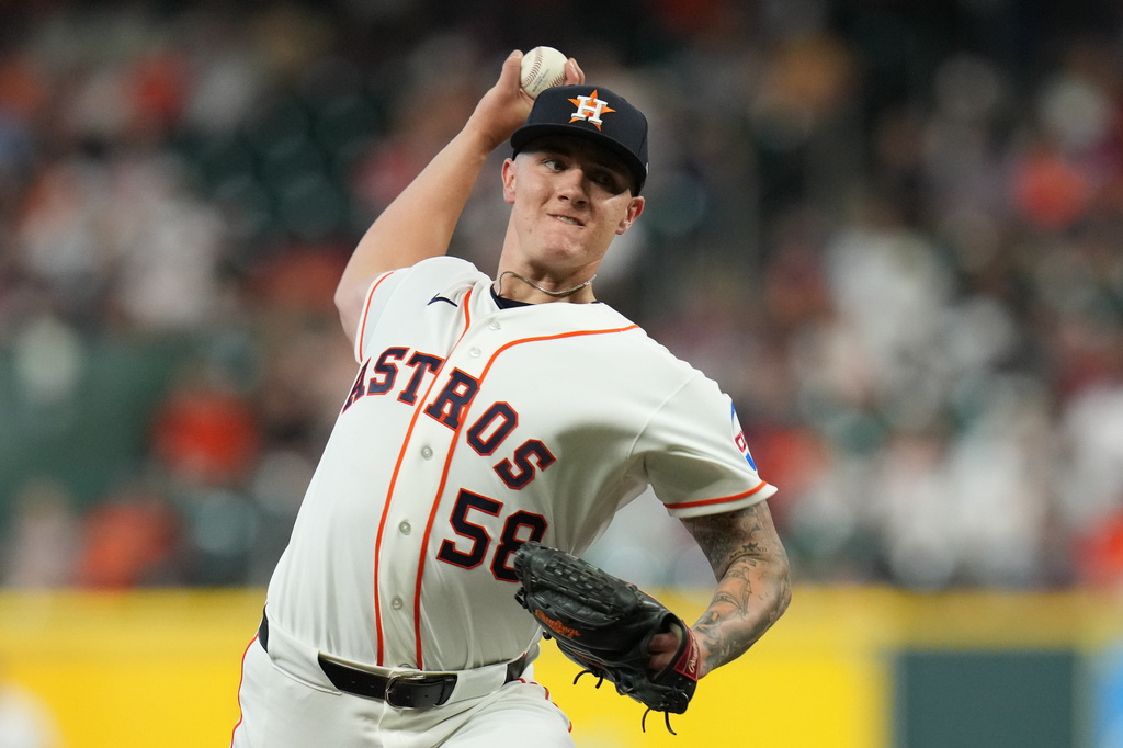 Houston Astros starting pitcher Hunter Brown delivers during the first inning of a baseball game against the Boston Red Sox in Houston, Tuesday, March 31, 2026. (AP Photo/Jon Shapley)