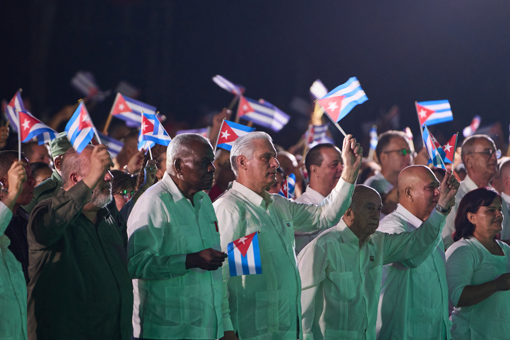 Cuban President Miguel Diaz-Canel, center, is seen during an event marking the 73th anniversary of the start of the Cuban Revolution in Pinar del Rio, Cuba, Sunday, July 26, 2026. (AP Photo/Ramon Espinosa)