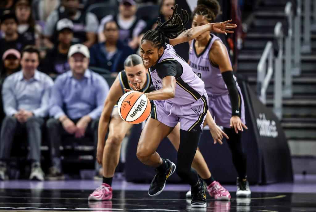 Golden State Valkyries' Tiffany Hayes, front, steals the ball from Chicago Sky's Gabriela Jacquez in the first half of a WNBA basketball game in San Francisco, Wednesday, Aug. 12, 2026. (Carlos Avila Gonzalez/San Francisco Chronicle via AP)
