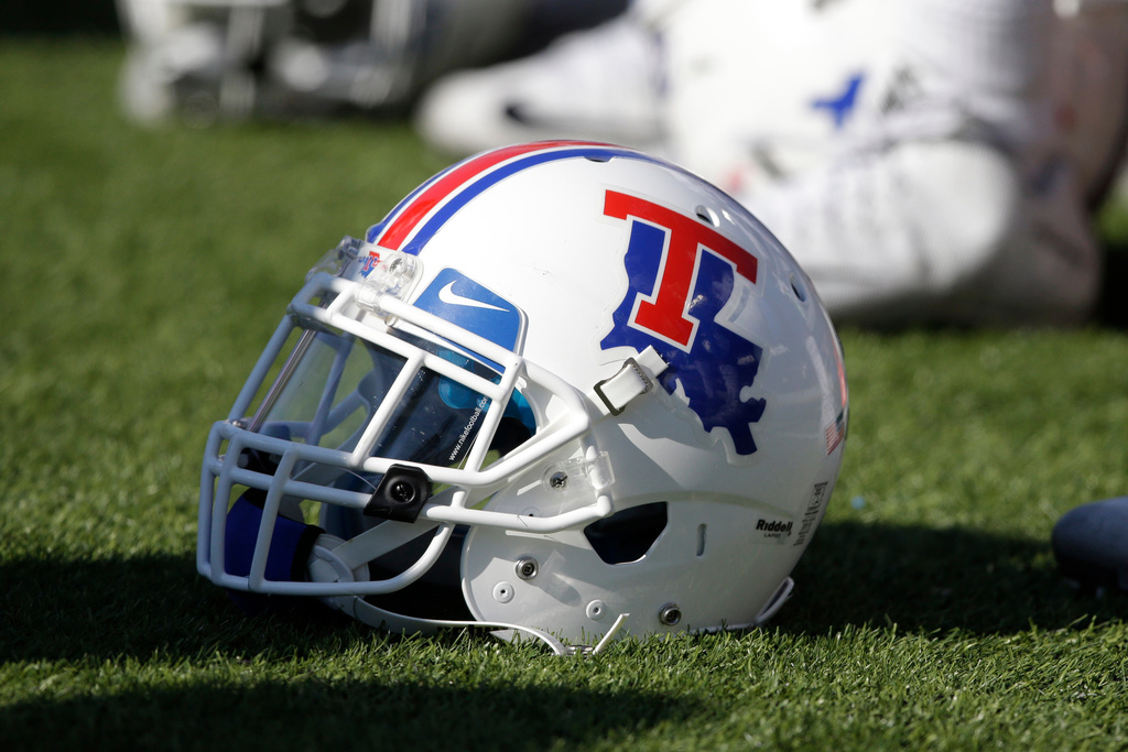 FILE - A Louisiana Tech helmet sits on the field an NCAA college football game against Kansas State in Manhattan, Kan., Saturday, Sept. 19, 2015. (AP Photo/Orlin Wagner, File)