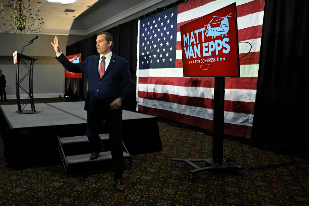 Republican candidate Matt Van Epps waves to supporters at a watch party after announcing victory in a special election for the U.S. seventh congressional district, Tuesday, Dec. 2, 2025, in Nashville, Tenn. (AP Photo/John Amis)