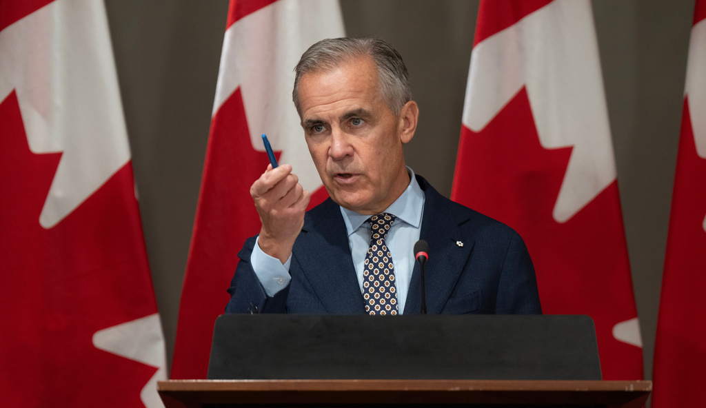 Prime Minister Mark Carney addresses caucus in Ottawa, Friday, Sept. 18, 2026. (Adrian Wyld/The Canadian Press via AP)
