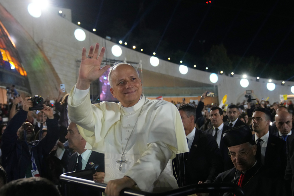 Pope Leo XIV arrives for a meeting with young people in the Square in front of the Maronite Patriarchate of Antioch in Bkerke, Lebanon, Monday, Dec. 1, 2025. (AP Photo/Domenico Stinellis)