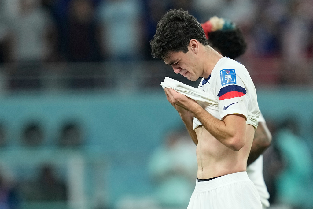 FILE -Gio Reyna of the United States is dejected after the World Cup round of 16 soccer match between the Netherlands and the United States, at the Khalifa International Stadium in Doha, Qatar, , Dec. 3, 2022. (AP Photo/Ebrahim Noroozi, File)