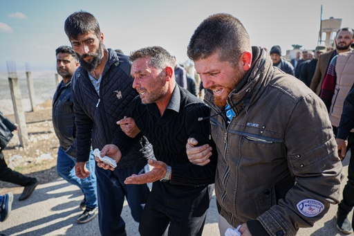 Men weep as they follow the funeral procession of three people killed when gunmen on motorcycles fired on a van near the Druze village of Kafr Maris in Syria's Idlib province, Wednesday, Oct. 22, 2025. (AP Photo/Omar Albam) Men weep as they follow the funeral procession of three people killed when gunmen on motorcycles fired on a van near the Druze village of Kafr Maris in Syria's Idlib province, Wednesday, Oct. 22, 2025. (AP Photo/Omar Albam)