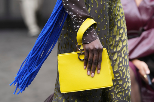 A model wears a creation part of the Ferragamo women's Spring-Summer 2026 collection, that was presented in Milan, Italy, Saturday, Sept. 27, 2025. (AP Photo/Luca Bruno). A model wears a creation part of the Ferragamo women's Spring-Summer 2026 collection, that was presented in Milan, Italy, Saturday, Sept. 27, 2025. (AP Photo/Luca Bruno).