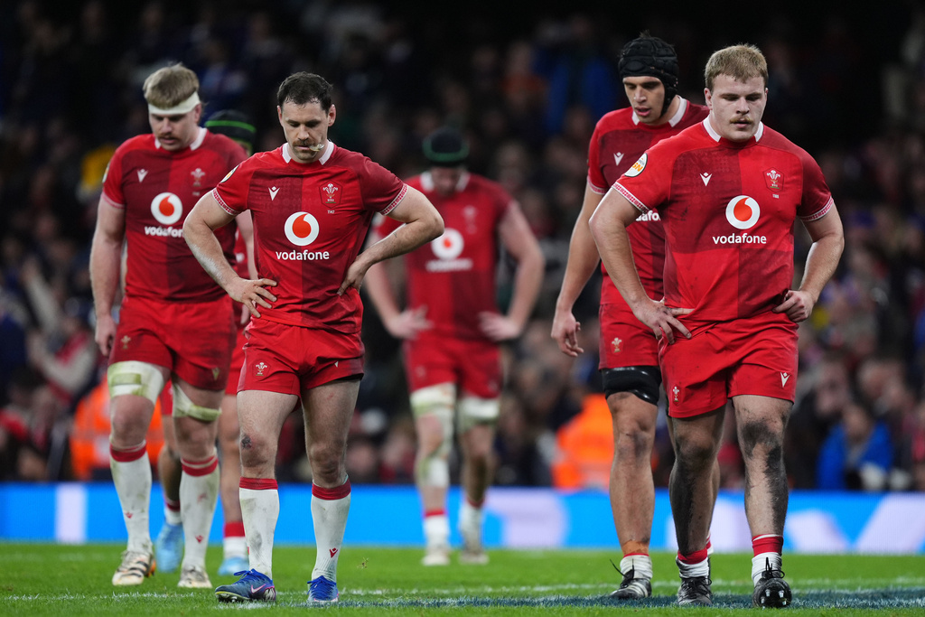 Wales's Archie Griffin, right, and Tomos Williams during the Six Nations rugby union match between Wales and France in Cardiff, Wales, Sunday Feb. 15, 2026. (Mike Egerton/PA via AP)