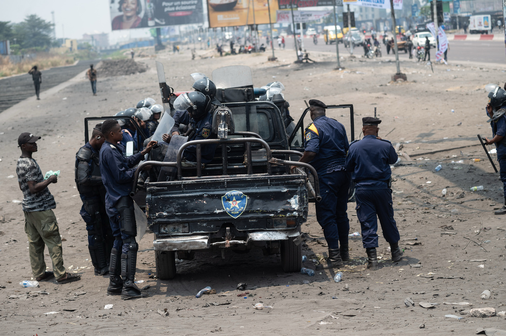 Security forces take position ahead of a protest organized by opposition parties against constitutional changes proposed by President Felix Tshisekedi, in Kinshasa, Congo, Tuesday, Sept. 15, 2026. (AP Photo/Samy Ntumba Shambuyi)