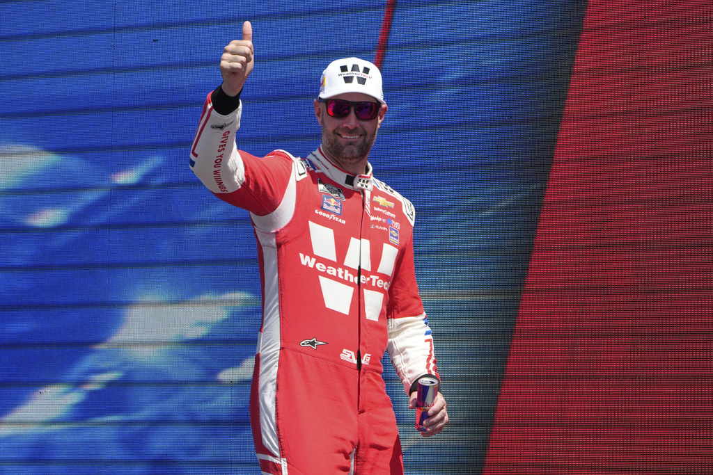 Shane van Gisbergen (88) is introduced before the start of a NASCAR Cup Series auto race in Watkins Glen, N.Y., Sunday, Aug. 10, 2025. (AP Photo/Seth Wenig)