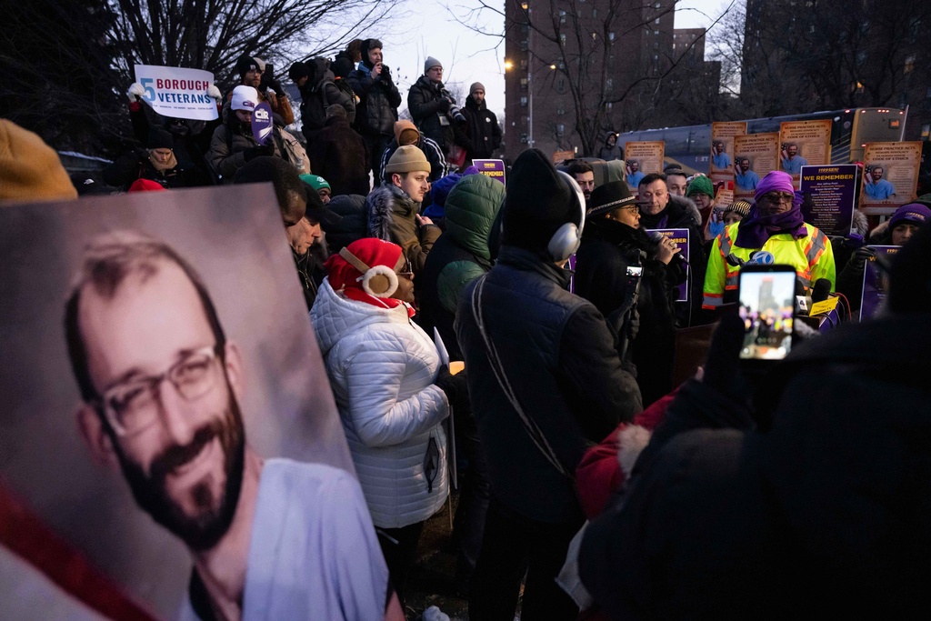 A photo of Alex Pretti is displayed during a vigil for Alex Pretti by nurses and their supporters outside VA NY Harbor Healthcare System, Thursday, Jan. 29, 2026, in New York. (AP Photo/Yuki Iwamura)