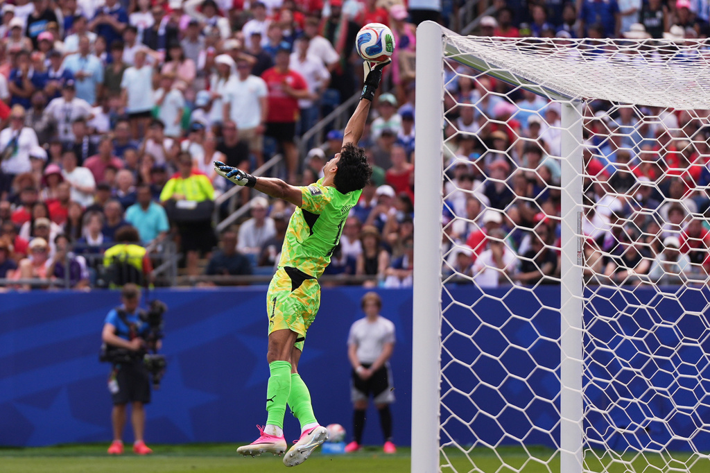 Morocco goalkeeper Yassine Bounou (1) reaches for the ball during the World Cup quarterfinal soccer match between France and Morocco in Foxborough, Mass., near Boston, Thursday, July 9, 2026. (AP Photo/Charles Krupa)