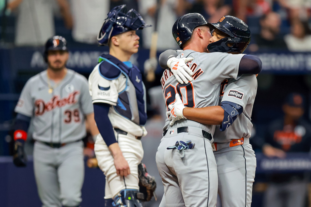 Detroit Tigers Spencer Torkelson celebrates the home run hit by Wenceel Pérez, right, as Tampa Bay Rays catcher Hunter Feduccia reacts during the second inning of a baseball game Tuesday, June 2, 2026, in St. Petersburg, Fla. (AP Photo/Mike Carlson)