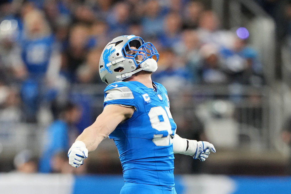 Detroit Lions' Aidan Hutchinson reacts after sacking Pittsburgh Steelers' Aaron Rodgers during the first half of an NFL football game, Sunday, Dec. 21, 2025, in Detroit. (AP Photo/Ryan Sun)