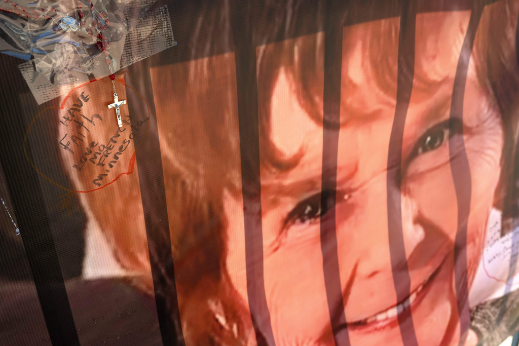 FILE - A banner with notes from hundreds of well-wishers for Nancy Guthrie, the missing mother of "Today" show host Savannah Guthrie, is displayed outside of KVOA Newsroom on March 6, 2026, in Tucson, Ariz. (AP Photo/Rebecca Noble, File)