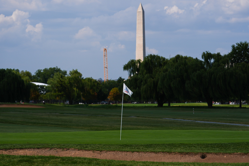 The Washington Monument is seen beyond the East Potomac Park Golf Course, Tuesday, Sept. 1, 2026, in Washington. (AP Photo/Julia Demaree Nikhinson)