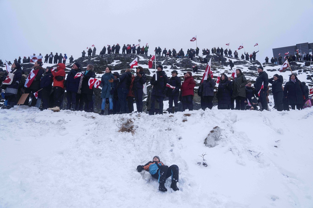 People protest against Trump's policy towards Greenland in front of US consulate in Nuuk, Greenland, Saturday, Jan. 17, 2026. (AP Photo/Evgeniy Maloletka)