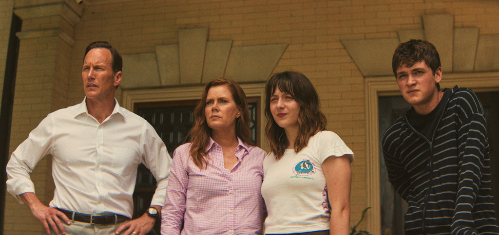 This image released by Apple shows, from left, Patrick Wilson, Amy Adams, Lily Collias and Joe Anders in a scene from "Cape Fear." (Apple via AP)