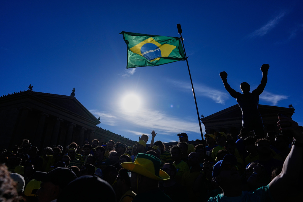 Fans of Brazil cheer as they gather at the Rocky Steps ahead of their team's World Cup group C soccer match against Haiti in Philadelphia, Thursday, June 18, 2026. (AP Photo/Petr David Josek)